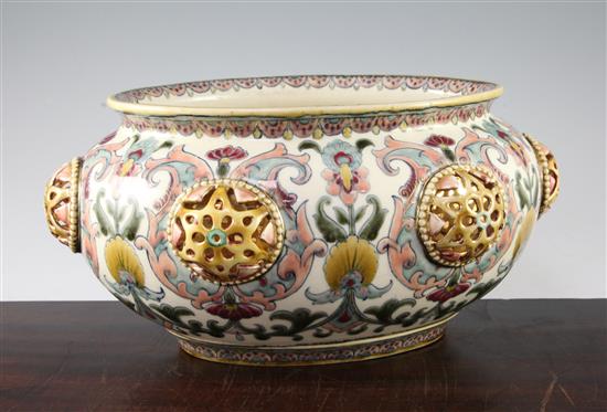 A Zsolnay Pecs pottery Persian inspired oval jardiniere, late 19th century, 29cm, slight restorations